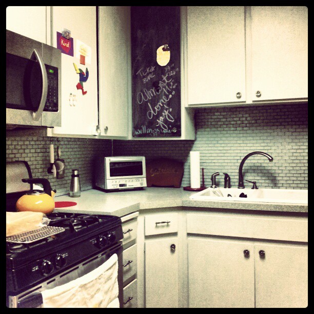 New sink, updates cabinets, new toaster, new microwave. The cabinet with to the right of the stove has magnetic paint. The black cabinet was painted with magnetic and chalkboard paint.